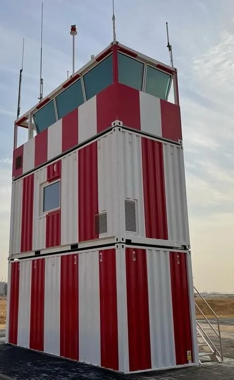 Red and white modular mobile ATC tower